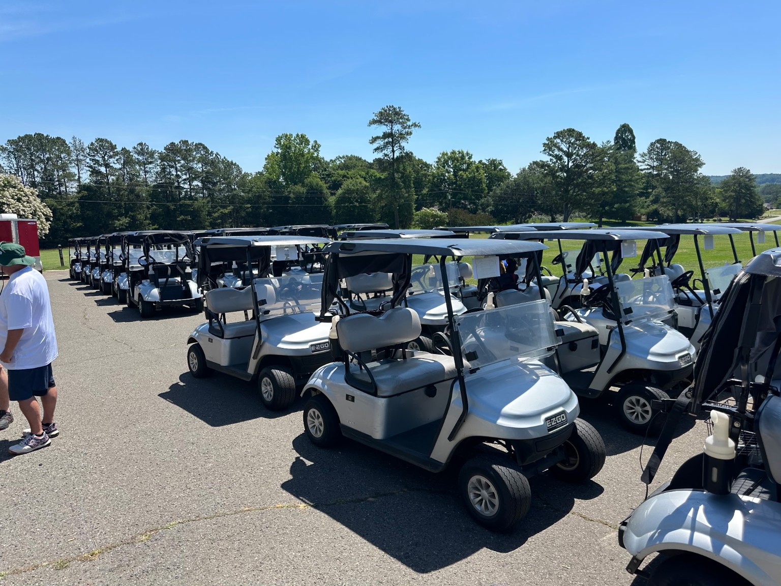 Golf carts lined up before the tournament