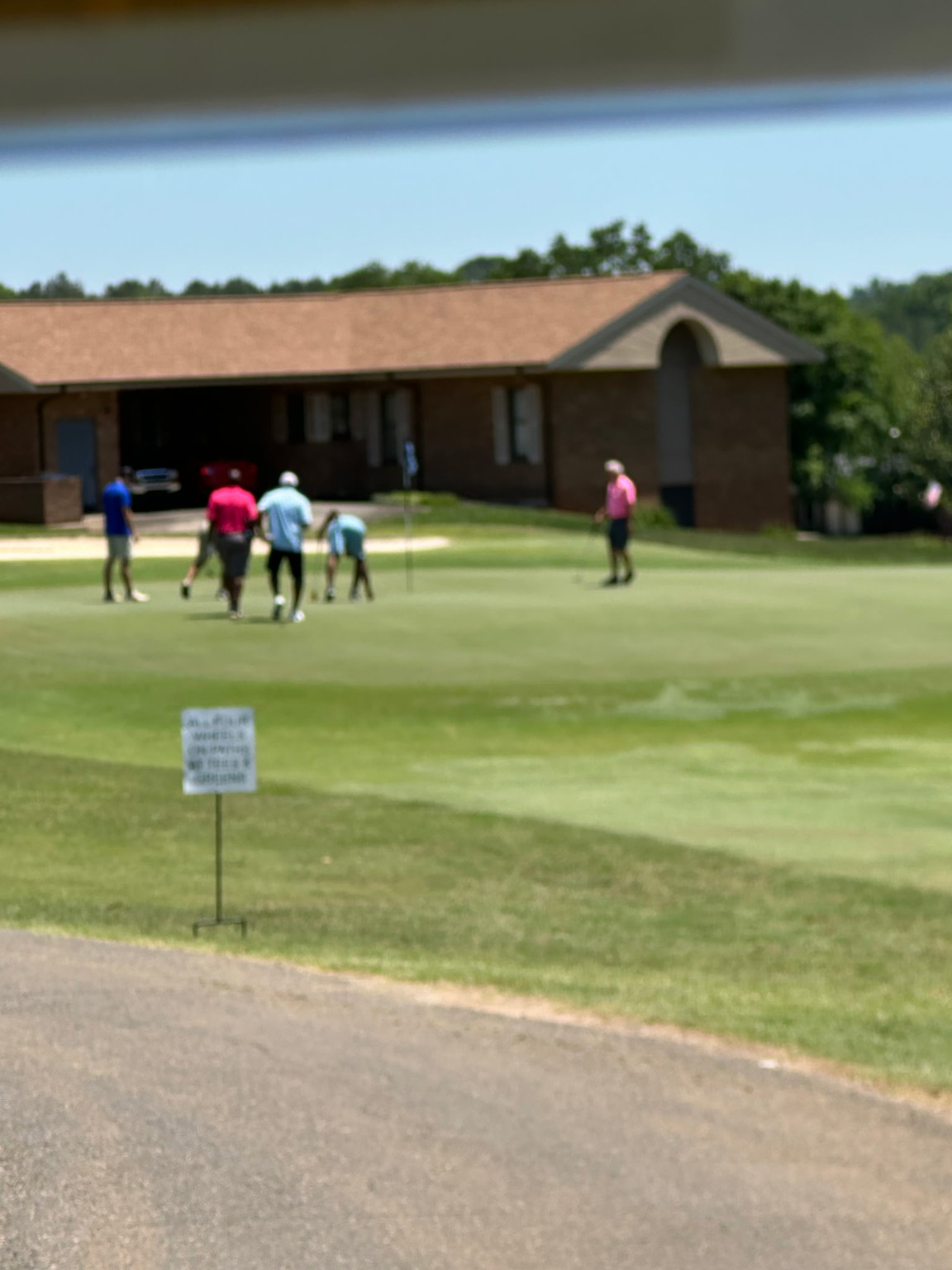 Golfers on the course during tournament play